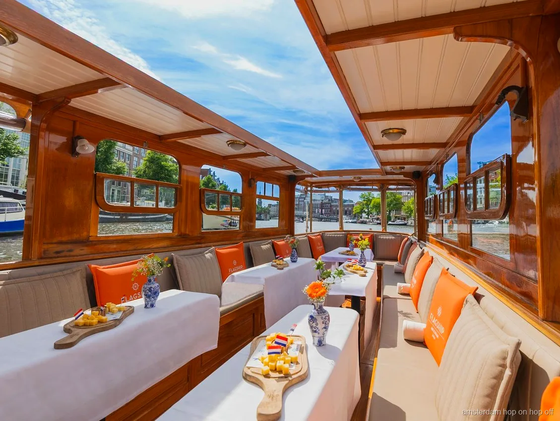 Amsterdam canal cruise boat with cheese and wine service on board