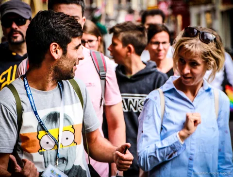 Small group on an Amsterdam walking tour through the historic center